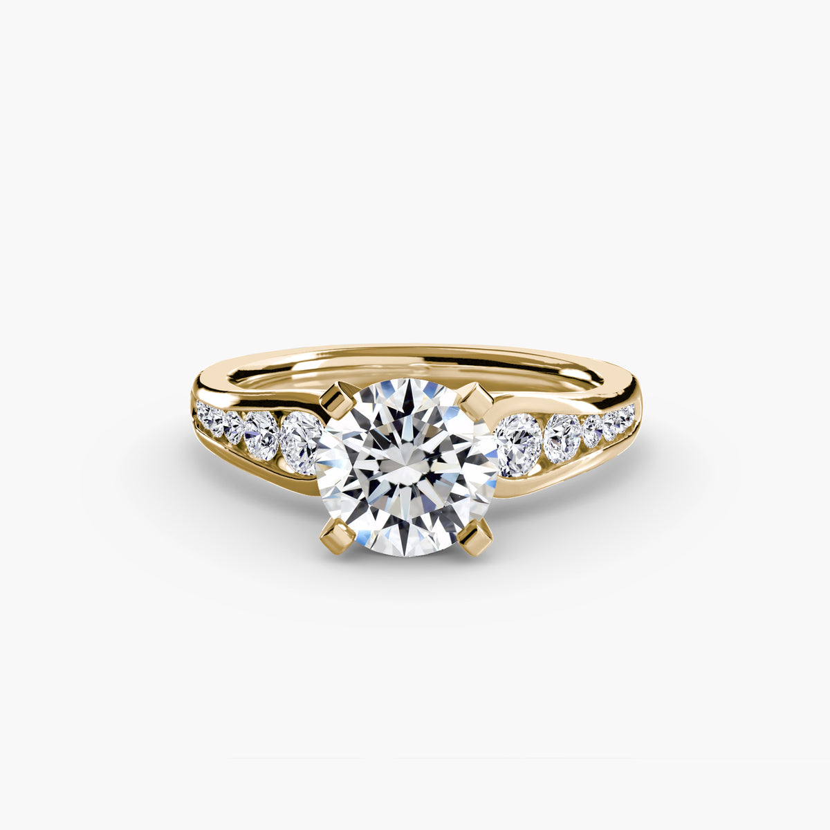 Solitärring mit abgestuften Diamanten in Kanalfassung
